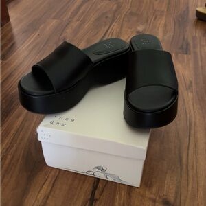 Women’s black platforms size 9